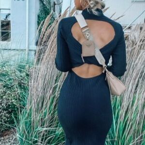 La Ros black long sleeve sweater dress with back cut out detail. NWT. Large.